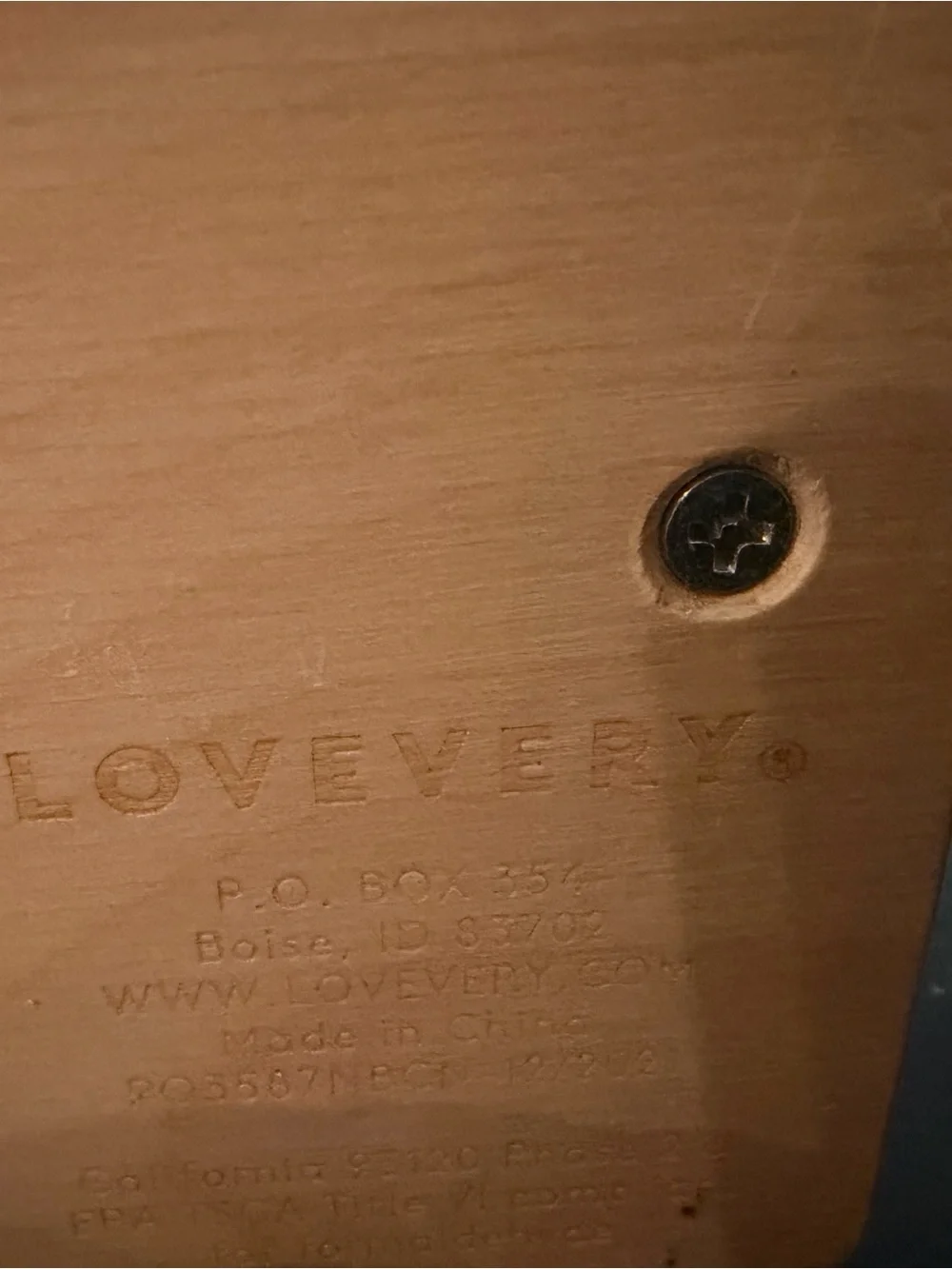 Lovevery Wooden Learning Spinner Toy with Blue and Red Panels